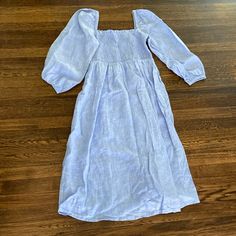 Reposhing This Item. Ended Up Going With A Different Dress For Family Photos, So It Was Never Worn Be Me! Excellent Condition! Casual Linen Smocked Dress With Smocked Back, Light Blue Casual Midi Dress With Smocked Back, Blue Long Sleeve Smocked Dress For Daywear, Casual Smocked Linen Dress With Ruched Detail, Blue Long Sleeve Smocked Day Dress, Casual Blue Smocked Dress For Brunch, Casual Light Blue Midi Dress With Smocked Bodice, Light Blue Casual Midi Dress With Smocked Bodice, Blue Smocked Square Neck Dress For Daywear