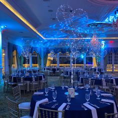 a banquet room with blue and white decor