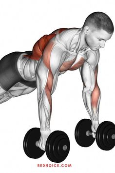 a man is doing push ups with dumbbells