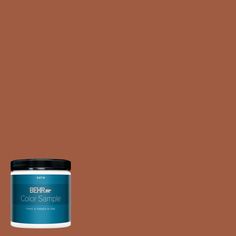 a can of behr paint on a white background