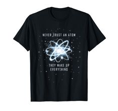 a black t - shirt with the words never trust an atom they make up everything