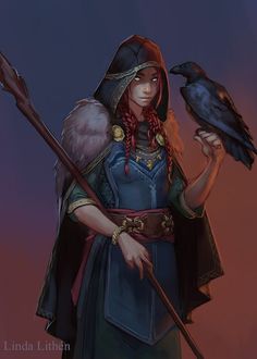 a woman dressed in medieval clothing holding a crow