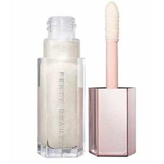 Fenty Beauty by Rihanna Ultimate lip gloss with extreme shine Non sticky feel XXL wand applies in one swipe Made with shea butter to condition lips Rihanna High, Lip Gloss Sephora, Fenty Beauty Gloss Bomb, Fenty Rihanna, Rihanna Diamonds, Long Lasting Lip Gloss, Gloss Labial, Luminizer, Eye Makeup Art