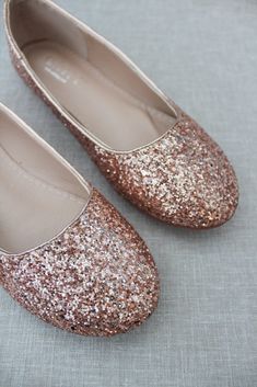 These sparkly round toe rock glitter flats are perfect for your wedding crew, date night, prom, quinceanera, holiday parties and so much more. Include them in your everyday fancy attire to add a little pop of color and shine. Available in 8 colors. DETAILS:UPPER: Synthetic upper and liningMATERIALS: Manmade outsoleHEEL HEIGHT: 0.3"Imported Materials Sparkly Wedding Shoes Rose Gold, Rose Gold Sequin Dress Shoes, Bridesmaid Shoes Flat, Style Categories, Quinceanera Shoes, Fancy Attire, Rose Gold Shoes, Glitter Ballet Flats, Sparkly Flats