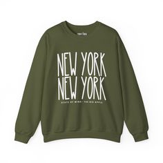 Elevate your urban style with our "New York New York Chic" Women's Sweatshirt, designed for those who appreciate the dynamic energy of the city that never sleeps. Embrace the essence of New York's iconic fashion scene while enjoying unparalleled cozy comfort. Crafted from premium materials, this sweatshirt is more than just a garment; it's a statement piece. The intricate design seamlessly integrates the bold "New York New York" lettering, showcasing your love for the city's vibrant spirit. The Urban Winter Tops With Logo Print, Urban Slogan Tops For Fall, Cozy Text Print Sweatshirt For Streetwear, Trendy Cotton Sweatshirt For Urban Adventures, Urban Relaxed Fit Winter Top, Trendy Oversized Sweatshirt For Urban Adventures, Urban Style Text Print Tops For Fall, Urban Tops With Text Print For Fall, Urban Text Print Tops For Fall