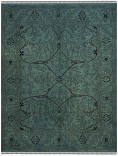 a blue rug with an intricate design on it