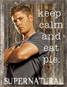 a man standing in front of a wooden fence with his arms crossed and the words keep calm and eat pie