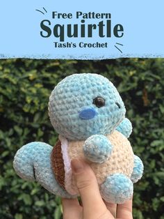 a hand holding a small crocheted blue and white stuffed animal with text overlay that reads free pattern squirtle tash's crochet