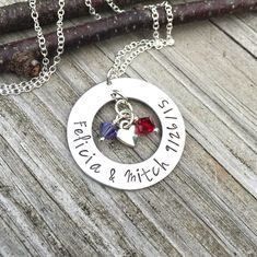 "This necklace makes the perfect gift for a bride to be or for an anniversary! 1\" aluminum washer comes hand stamped with the happy couple's names and special date with 2 genuine Swarovski crystal birthstone charms and a silver heart charm. You may also choose a different short phrase if you prefer, just please message me first to be sure that I can fit it on there. My items are hand stamped by me, making them a unique gift. Each letter is stamped individually and may not line up exactly adding Customizable Silver Jewelry For Anniversary Gift, Nickel Free Jewelry For Anniversary On Valentine's Day, Nickel-free Jewelry For Wedding On Valentine's Day, Hand Stamped Jewelry For Anniversary And Mother's Day, Hand Stamped Jewelry For Anniversary Gift On Mother's Day, Hand-stamped Jewelry For Mother's Day Anniversary, Customizable Sterling Silver Necklace For Wedding, Anniversary Jewelry With Birthstone In Stainless Steel, Stainless Steel Birthstone Jewelry For Anniversary