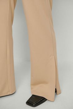 These wide leg trousers feature an elasticized waistband. They have an ankle slit. Future Fashion, Wide Leg Trousers, Women Empowerment, Over Knee Boot, Casual Pants, Wide Leg, Trousers, Pants