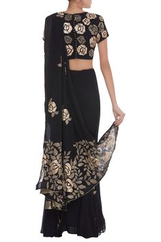 Grab all attention of the crowd wearing this black georgette pre draped saree. It features flower applique work all over. It comes with a heavy applique work embroidered blouse.
Set of 2
Flower applique work
Round neckline - Aza Fashions Fitted Chiffon Blouse With Traditional Drape, Formal Black Silk Pre-draped Saree, Silk Black Blouse Piece For Reception, Elegant Fitted Chiffon Blouse Piece, Elegant Black Georgette Blouse, Black Silk Pre-draped Saree For Evening, Black Silk Evening Blouse Piece, Fitted Chiffon Saree For Evening, Chiffon Pre-draped Saree For Evening