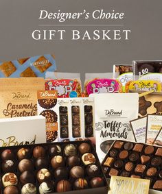 the designer's choice gift basket includes chocolates, candies and more