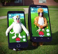 two cell phones with pictures of people in costumes on them, one being a cat and the other is a dog