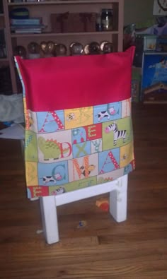 a child's chair made out of blocks and fabric