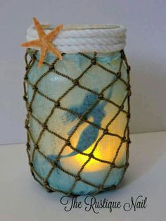 a candle that is sitting in a glass jar