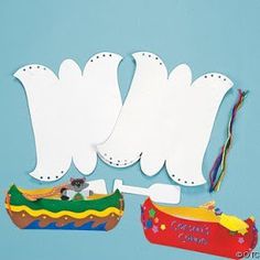 paper cutouts are sitting on top of each other, and one has a boat in it