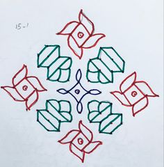 a drawing with colored lines in the shape of an ornament on white paper