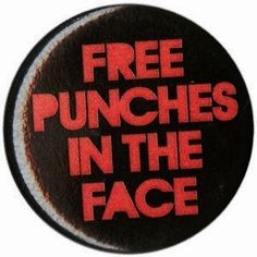 a button that says free punches in the face