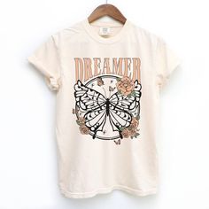 Break the fashion rules in style with our Dreamer Retro Butterfly Short Sleeve T-shirt! This comfy, oversized tee features the perfect blend of boho charm and vintage vibes, for a look that's sure to turn heads. Symbolic of freedom and individuality, you'll love expressing your true self in this one-of-a-kind graphic tee. Dare to fly! Toddler Graphic Tee, Retro Butterfly, Fashion Rules, Newborn Bodysuit, Love Express, Butterfly Theme, Kids Wardrobe, Kids Graphic Tees, Comfort Colors Tee