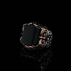 Men's onyx gemstone signet ring which will give you a head turning presence. This mystic, vintage style, engraved ring has a unique design for the polished, refined, and distinguished man. Perfect for casual and formal events, it will make your friends envious as you walk into the room full of confidence and pride. Looking for a unique, one of a kind GIFT FOR HIM, groomsman gift, father's day gift, teacher day gift? Look no further. This cool gemstone ring is the right answer and best gift for a Symbolic Black Oval Jewelry, Collectible Onyx Ring Jewelry, Black Symbolic Signet Ring With Polished Finish, Ottoman Jewelry, Onyx Ring Men, Turkish Ottoman, Infinity Band, Birthstone Gems, Fantasy Gifts