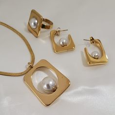 Stainless Steel Metal Jewelry Sets With Plating For Gifts, Gold Stainless Steel Jewelry For Wedding, Elegant Metal Rings With Plating, Elegant Plated Metal Rings, Classic Stainless Steel Jewelry With Plating, Elegant White Rectangular Jewelry, Modern Stainless Steel Wedding Jewelry, Gold Stainless Steel Jewelry Sets As Gift, Modern Jewelry With Matching Earrings For Gift