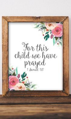 a wooden frame with the words for this child we have passed and flowers on it