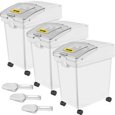 three plastic storage containers with lids and spoons on each side are shown in front of white background