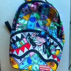 Limited Edition Sprayground Monopoly Backpack Brand New With Tags Functional Multicolor Bags For Streetwear, Spray Ground Bookbag, Spray Ground Backpack Rick And Morty, Cute Sprayground Bookbags, Black Sprayground Backpack, Sprayground Backpack Limited Edition, Backpack Free, Backpack Brands, Monopoly