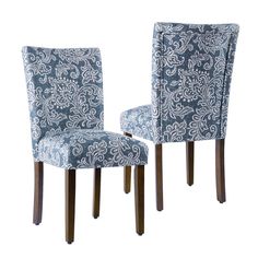 two blue and white chairs sitting next to each other