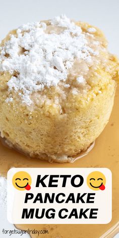 a close up of a cake on a plate with the words keto pancake mug cake