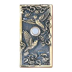 a lighter cover with a bird design on it's front and back side, in gold