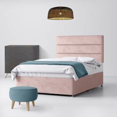 a bedroom with a bed, nightstands and a footstool in pastel colors