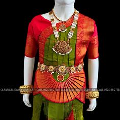 Design by Classical Dance Jewelry® ❥ Traditional Bharatanatyam costume wore during regular dance programs or arrangetram performance. ❥ Material : Art Silk ❥ Type : Traditional pant costume ❥ Easy to wear ❥ layer front fan ❥❥❥❥ 30 inch PANT LENGTH Dress Measurements ( all the measurements approximately 1 -2 margin buffer) Age: 7 - 9 yrs ❥ PANT MEASUREMENTS: ☛ Pant Length: 29-30 inch ☛ Pant Waist: 27-28 inch ☛ Pant Hip: 28-29 ❥ BLOUSE MEASUREMENTS : ☛ Blouse length: 10-11 inch ☛ Blouse Shoulder : Traditional Green Choli With Tilla Detailing, Traditional Green Choli With Tilla Embroidery, Traditional Green Tilla Choli, Green Tilla Sets For Traditional Ceremonies, Ceremonial Green Cutdana Sets, Green Temple Jewelry Sets For Festive Occasions, Festive Green Temple Jewelry Sets, Green Traditional Wear With Tilla For Ceremonies, Ceremonial Green Saree Set