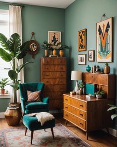 a living room filled with furniture and lots of plants