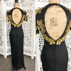 Vintage silk lined dressMade by MonikaSize 6Length: 46.5" from armpit downChest: 36"Waist: 27"Hips: 34-38"Color: black, goldShell 100%  silkLining 100% PolyesterMade in IndiaGood vintage condition. It has some missing beads but hard to noticeable.Please expect some normal wear due to age. Please look at all photos: lighting is different on all computers. Ask all questions before buying. Sequin Black Dress, Off White Lace Dress, Nude Lace Dress, Crochet Lace Dress, Black Sequin Dress, Evening Wedding, Open Back Dresses, Wedding Cocktails, Lace Maxi Dress