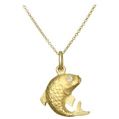 For courage, achievement, and strength - This beautiful Koi Charm is crafted in solid 18K green gold with two diamond eyes. The cable chain is 16-18" adjustable. Length: .5" Made in the US This charm can be sold separately from the chain or soldered onto one of our wire bangles. Signature Collection: non negotiable Gold Koi Fish, Gold Koi, Gold Chain Design, Gold Elephant, Wire Bangles, Diamond Eyes, Elephant Charm, Feather Charms, Chain Design