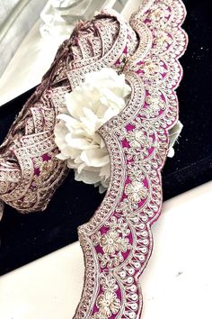 >>Add elegance to your bridal or festive wear with this luxurious Indian Sari Trim. Featuring intricate zari embroidery, this scalloped trim is perfect for enhancing wedding attire, bridesmaid dresses, lehengas, and festive sarees.  >>Measuring 7cm  it's crafted from premium quality fabric, making it suitable for a range of traditional and contemporary designs Length: 9 yards Design: Elegant scallop pattern with intricate zari detailing Color: Stunning Gold Zari And rich Colours For a  sophistic Festive Red Embroidered Fabric With Border, Red Lace Embroidered Fabric With Sequins, Diwali Semi-stitched Embroidered Lace Fabric, Red Sequined Lace Embroidered Fabric, Bohemian Semi-stitched Embroidered Fabric With Border, Scallop Pattern, Zari Embroidery, Saree Border, Festive Wear