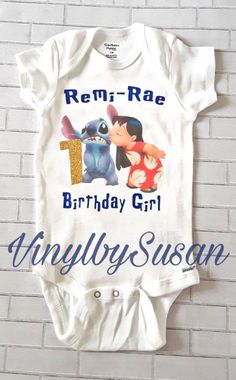 Lilo & Stitch inspired custom birthday tshirts. Alterable design. Individual & Family tshirts. Available in infant bodysuit. Design works best on white, but if you prefer another color, list in personalization section. **List child sizes, names, style (bodysuit or tshirt), age, etc., in personalization section. PLEASE NOTE THAT DUE TO THE VOLUME OF ORDERS, ORDER PROCESSING TIME IS 7-10 DAYS. WHEN ORDERING SHIRTS, GROUP SHIRTS, OR TUTU SETS NEEDED FOR A BIRTHDAY, PLEASE LEAVE THE DATE NEE Fun Fitted T-shirt For Birthday, Blue Fitted Top For Birthday, Fitted Blue Top For Birthday, Funny Unisex Tops For Birthday, Unisex Custom Print Tops For Birthday, Funny Fitted Top For Birthday, Themed Character Print Birthday Tops, Customizable Fitted T-shirt For First Birthday, Themed Pre-shrunk Tops For Birthday