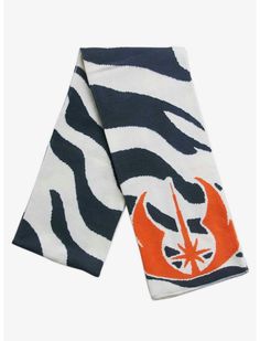 the star wars scarf has an orange and black design on it, with zebra print