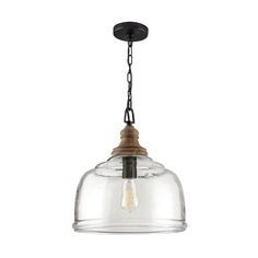 a glass light fixture hanging from the ceiling