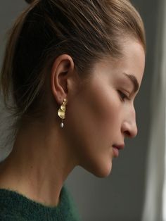 A modern take on peals. Brass earrings with fresh water pearl drop. Made in NYC. Measures: 9/16" (1.5cm) (W), 1 3/8" (3.5cm) (H) Pearl : 5mm Fresh Water Pearl, Seed Pearl, Brass Earrings, Pearl Studs, Pearl Drop, Fresh Water, Freshwater Pearls, Brass, Sterling Silver