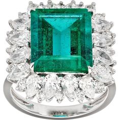 Ignite your passions with the exquisite Love And Commitment Opera Ring from Ruchi New York. A modern classic, this ring is a showstopping centerpiece featuring a mesmerizing Colombian emerald surrounded by a halo of mixed shape diamonds. With 5.58 carats of Colombian emerald and 2.65 carats of dazzling diamonds, this ring embodies elegance and sophistication.Part of Ruchi's esteemed High Jewelry collection, the Love & Commitment Opera Ring symbolizes the pinnacle of romance and commitment. Crafted to honor and celebrate every love affair, this collection offers exceptional diamond and gemstone jewelry designed to reflect the uniqueness of each romance and milestone. Whether it's scintillating diamond engagement rings, wedding bands, or colorful gemstone anniversary bands and bracelets, eac Luxury Emerald-cut Emerald Ring With Halo Design, Luxury Platinum Emerald Ring With Halo Design, Luxury Emerald Cut Emerald Ring With Halo Design, Luxury Emerald Rings With Halo Design, Elegant Gia Certified Emerald Ring, Luxury Emerald Ring With 17 Jewels For Promise, Luxury Emerald Ring With Halo Design, Luxury Green Diamond Ring With Halo Design, Elegant Green Diamond Ring With Brilliant Cut