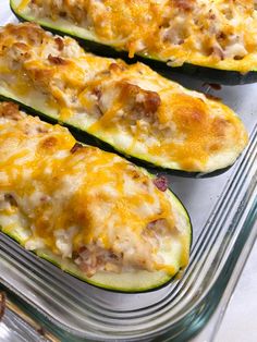 baked chicken bacon ranch zucchini boats on a baking sheet with text overlay