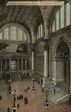 the interior of an old building with people walking around