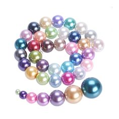 multicolored pearl beads on white background