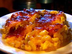 a white plate topped with macaroni and cheese