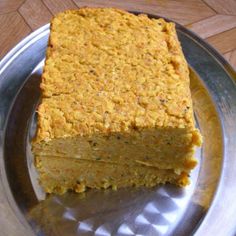 a piece of cake sitting on top of a metal plate