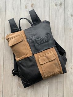 One of a kind upcycled leather backpack made from leather jacket using original pockets. Sustainable purse, perfect for gift.  Backpack is very light and comfortable to wear every day. Big enough for all necessities.  |WIDTH: 32 cm (12.6 in).  |HEIGTH: 42 cm (16.5 in).  You can choose recycled leather backpack plus leather purse. Pouch is perfect for your cosmetics, laptop charger or to use it as evening bag. It is made from the finest, soft, supple genuine upcycled leather. Accessorized with zi Casual Leather Backpack With Pockets For Everyday Use, Urban Brown Leather Bags, Leather School Bag With Pockets, Rectangular Leather Backpack With Pockets For Everyday Use, Functional Leather Backpack With Pockets For Everyday, Brown Leather Backpack With Pockets For Everyday, Brown Leather Everyday Backpack With Pockets, Functional Leather Backpack With Multiple Pockets For Everyday Use, Black Functional Leather Backpack With Pockets