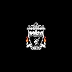 the liverpool football club logo on a black background with red and yellow flames in the center