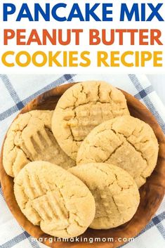 three peanut butter cookies in a wooden bowl on a checkered tablecloth with text overlay